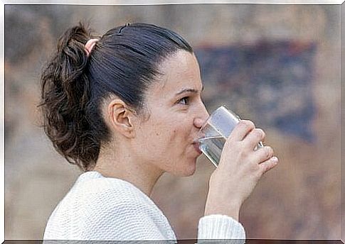 Woman drinks water