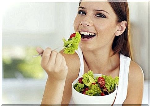 Healthy eating woman eating a salad