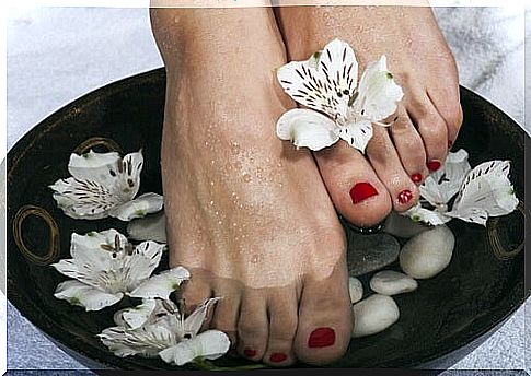 foot bath in cold water and flowers 