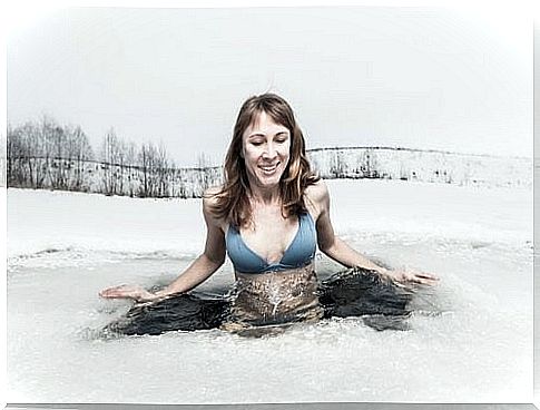 woman takes a bath in ice water