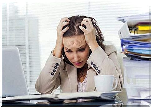 Stressed woman in the office