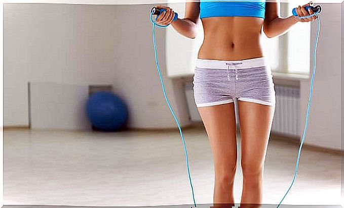 woman prepares to jump rope