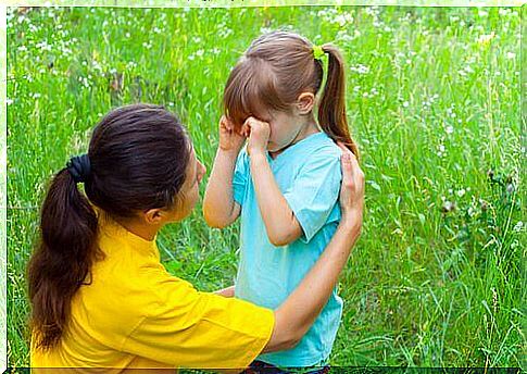 Mom calming her daughter