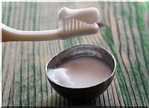 Toothbrush and bowl with homemade toothpaste