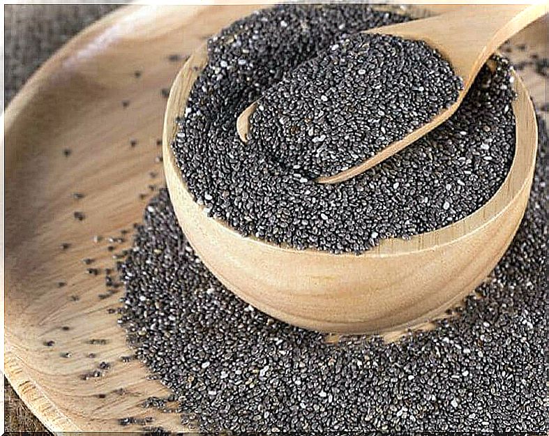 Chia seeds in wooden bowl