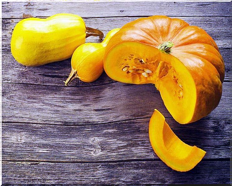 Pumpkin cut on dark wooden table