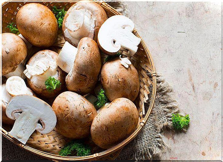 Mushrooms in a small bowl with flavorings